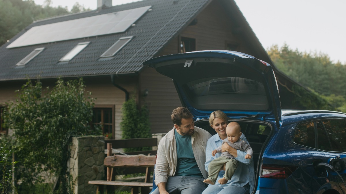 happy family driving a modern electric car on a sunny highway, safety concept, lifestyle photography, high resolution
